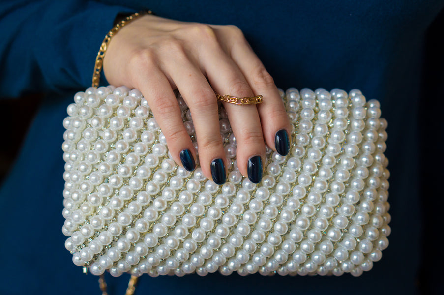 Pearl studded evening clutch
